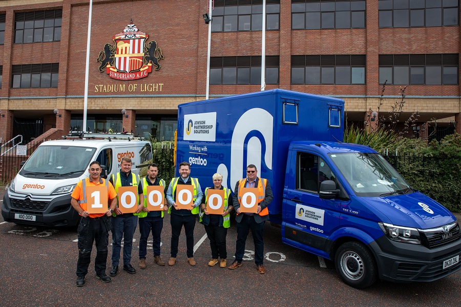 Group of people standing in front of the stadium of light drop-off point